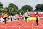 No 63 Charlotte McLennaghan (Notts) wins from No 78 Ashleigh Clarke 2nd and No 77 Jazz Crawford (both Surrey) 3rd in the Junior Girls 200 metres.